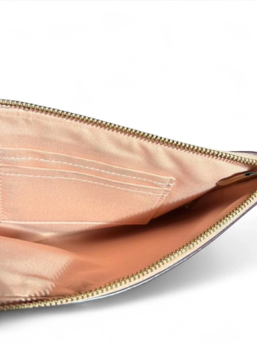 Coach Pebbled Leather Wristlet in Peach